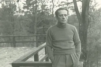 Harvey Fite standing outdoors in an archival Bard College photograph